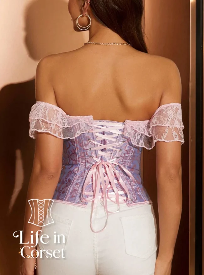 Corset bleu pastel à broderies Océana (arrière) Corset bleu pastel à broderies Océana (arrière)