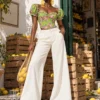 Bustier vert fleuri à manches bouffantes (vue plain pied) Bustier vert fleuri à manches bouffantes