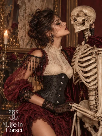 Corset underbust noir à motifs baroques (vue de profil) Corset underbust noir à motifs baroques